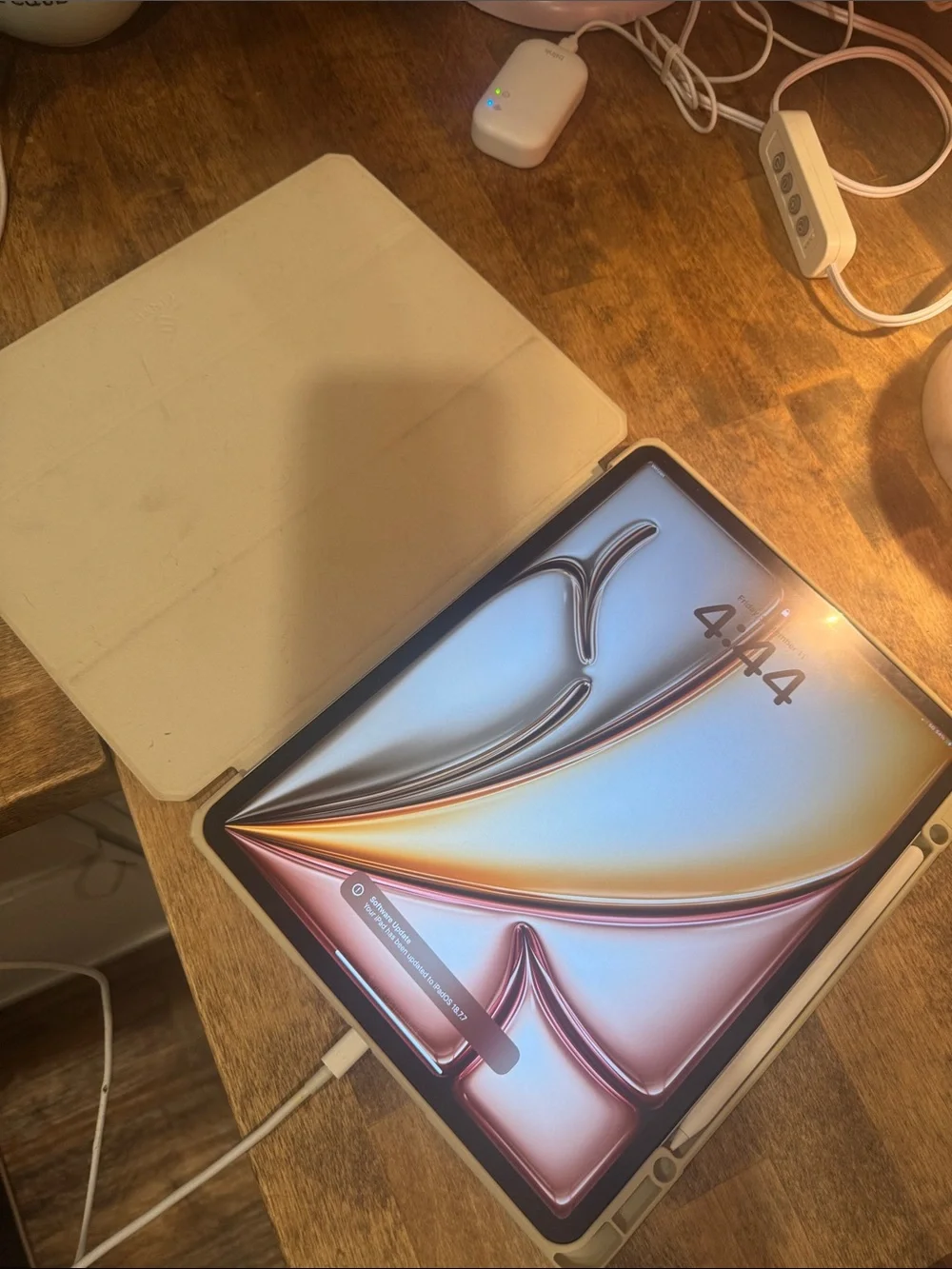 iPad Air with White Smart Cover and Stylus.